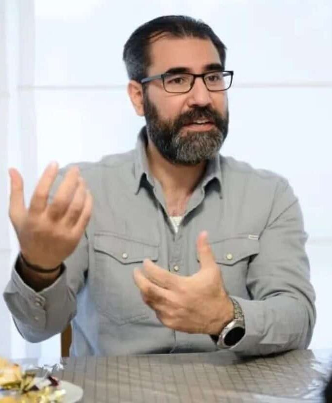 In 2016, Karim Hassoun (pictured) honored a slain Hezbollah terrorist outside the Museum and Documentation Centre on Holocaust and Human Rights in Mechelen, the site of the transit camp from where Jews and Romani in Belgium were sent to Auschwitz. Credit: European Jewish Press.