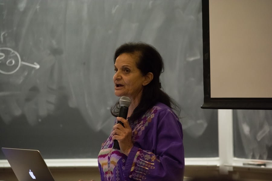 Rasmea Odeh speaks during an event held by Students for Justice in Palestine on Monday. Students expressed varied reactions to her speaking on campus. 
